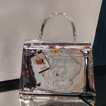 AT059, The Kelly, silver chrome, by Tessi  35x12x34cm.