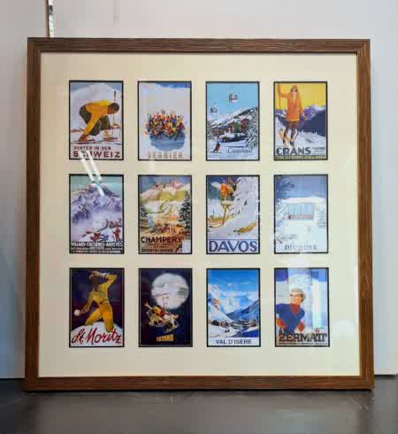 Encadrement décoratif regroupant des affiches vintage de stations de ski alpines comme Verbier, Davos, Megève ou Zermatt, style rétro montagne